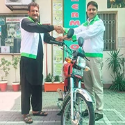 Mr.Agha Ahmad Raza (GMO) handing over Motor Bike key to Employee.